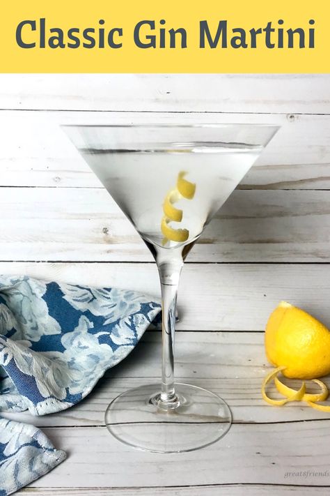 A martini glass with a clear martini in it and a lemon peel and a blue cloth napkin on the side and a half of a lemon on the side. Classic Gin Martini, Martini Recipes Gin, Classic Martini Recipes, Gin Martini Recipes, Martini Recipes Classic, Crazy Cocktails, Martini Flavors, Molecular Food, Bar Tending