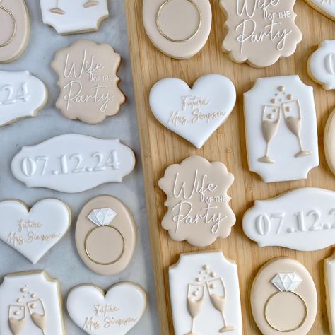 This listing is for 24 bachelorette cookies. All cookies range from 3" - 3.5". Other colour options are available upon request.  The set includes: 5 gold rings 5 wife of the party 5 wedding date (please add in personalization) 5 hearts with Future Mrs. __? (please add in personalization)  4 champagne glasses  Flavour: vanilla sugar cookies All cookies are hand crafted using fresh premium ingredients including home-made vanilla extract and are decorated with royal icing. All cookies are made fres Engagement Themed Cookies, Anniversary Party Cookies, Pearls And Prosecco Bridal Shower Theme Cookies, Dance Decorated Cookies, Royal Icing Engagement Cookies, Love Is Brewing Bridal Shower Cookies, Wedding Themed Cookies, Wedding Cookies Ideas Decorated, Just Married Cookies