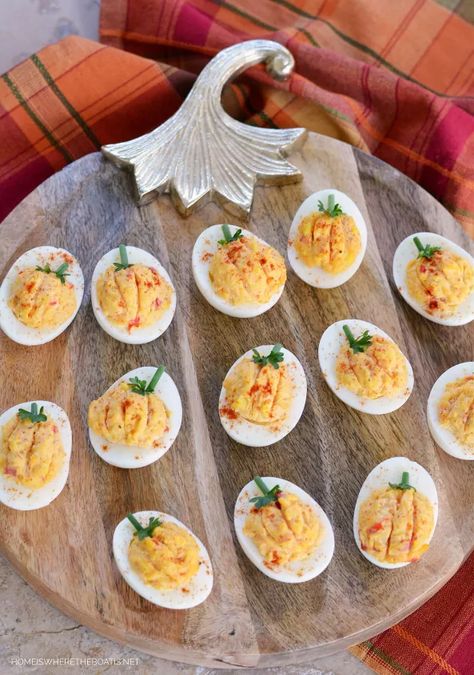 A fun fall deviled egg appetizer, filled with cheesy flavor! These deviled eggs get their pumpkin color and cheesy flavor from the  Pâté of the South, pimento cheese!Use your favorite store brand of pimento cheese to make these deviled eggs or your favorite pimento cheese recipe. To make the pumpkin shape, I used a small cookie scoop to mound the deviled egg mixture into the egg white half. Depending on the consistency of your mixture, you may want to chill it briefly so your… Pie Crust Leaves, Turkey Desserts, Egg Appetizer, Pumpkin Spice Ice Cream, Fall Appetizer, Pumpkin Granola, Pimento Cheese Recipes, Pumpkin Bread Pudding, Fall Appetizers