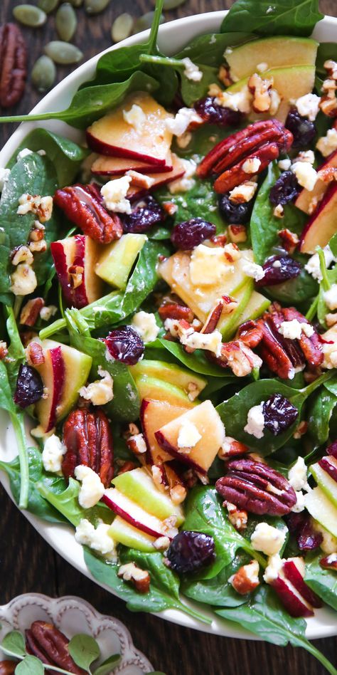 Apple Spinach Salad with Pecans, Cranberries, Goat Cheese, and homemade Maple-Lime Mustard Dressing in a white bowl. Pecan Salad Dressing, Spinach Goat Cheese Salad, Apple Spinach Salad, Salad With Pecans, Simple Spinach Salad, Christmas Salad Recipes, Spinach Salad Recipes, Salad Dressing Recipe, Fresh Salad Recipes