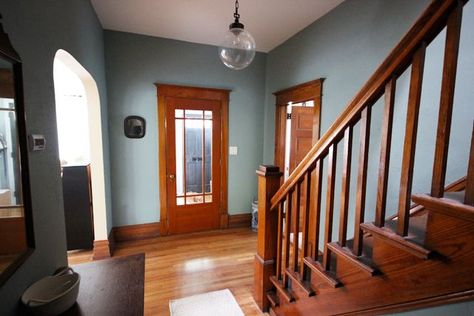 I like the tone of color along with the trim Stratton Blue with wood trim Benjamin Moore ... Colors With Wood Trim, Stratton Blue, Natural Wood Trim, Dark Wood Trim, Dark Trim, Oak Trim, Kitchen Wall Colors, Grey Paint Colors, Trendy Living Rooms