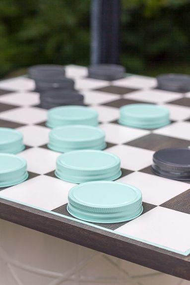 Giant Checkers Game from Mason Jar Lids! Your kids are going to flip when they see this! We spend quite a bit of time outside and have recently been adding to our outdoor game collection. Giant Checkers, Diy Yard Games, Checkers Game, Mason Jar Lids, Yard Games, Diy Yard, Backyard Games, Diy Games, Wedding Games