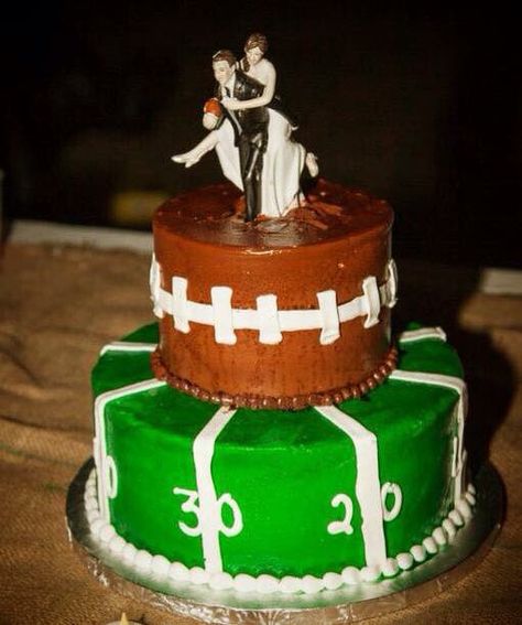 Football grooms cake with his cheerleader! Burden | Moore Wedding Essie Weddings Grooms Cake Ideas Football, Grooms Cake Football, Cowboy Theme Wedding, Football Grooms Cake, Grooms Table Ideas, Football Wedding Cake, Rehearsal Dinner Cake, Groomsmen Cake, Football Wedding Theme