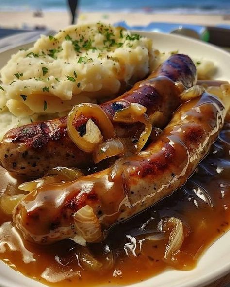 grandma's favorite recipes Grilled Cheese Hot Dog, Bangers And Mash Recipe, Onion Gravy Recipe, Sausage And Mash, Pork Sausages, Buttery Mashed Potatoes, Steak Bites Recipe, Mash Recipe, Bangers And Mash