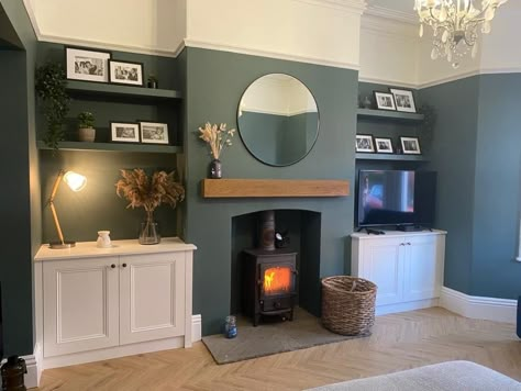 Living Room Designs With Alcoves, Dark Living Rooms Cozy Accent Wall, Living Room Decor Terraced House, Small Cosy Room Ideas, Tan Decor Living Room, Living Room Ideas With Alcoves, Green Feature Fireplace Wall, Green Living Room With Log Burner, 1930s Style Living Room