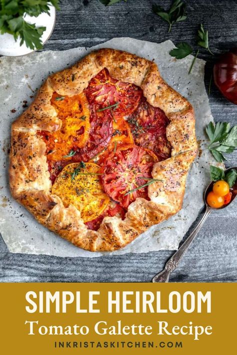 This savory Heirloom Tomato Galette recipe will become your favorite summer go-to meal! Serve it as a main course or a side dish, for a crowd, or as a weeknight dinner. Delicious garden fresh heirloom tomatoes seasoned with fresh garlic & thyme then layered onto a crispy flaky galette dough with parmesan & sharp cheddar cheese, baked to golden brown perfection & topped with fresh chives & basil. Head over to the blog for the complete dinner recipe for Heirloom Tomato Galette, & give it a try. Heirloom Tomato Recipes, Heirloom Tomato Tart, Tomato Galette, Happy Hour Appetizers, Fresh Tomato Recipes, Galette Recipe, Tomato Tart, Tomato Pie, Heirloom Tomato