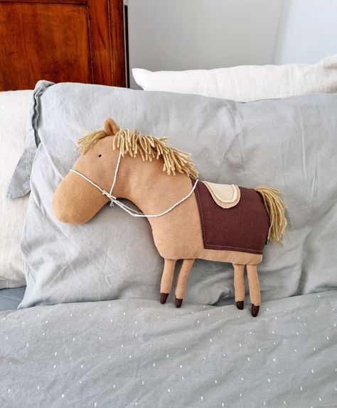 "THE RODEO PONY. The Rodeo Pony is made of high quality French terry sweatshirt fabric. It was designed, patterned and handmade by me. The toy is very soft, perfect for cuddles! It can be use also as a very sweet and beautiful decorative pillow for your baby crib or kids bed. - The body is made of very soft GOTS certificate French terry (95% cotton, 5% elastin) and OEKO-tex certificate 100% cotton fabric. - Length: approx. 13\" (33cm) wide / 11\" (28cm) tall. - Filling: soft hypoallergenic polyf Plush Horse, Horse Pillow, Kids Bed, Toy Horse, Hobby Horse, Jewelry Charms, Sweatshirt Fabric, Baby Crib, Shell Necklace