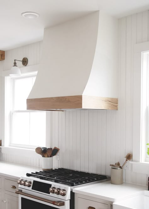 Learn how to build this white and wood curved range hood cover! #diy #kitchenremodel #rangehood Range Hood Cover Modern, Undercabinet Range Hood, Wooden Hoods Over Stove, Range Hood Cover Diy, Range Hood Cover Ideas, Curved Range Hood, Diy Range Hood Cover, Wood Hood Vent, 70s Life