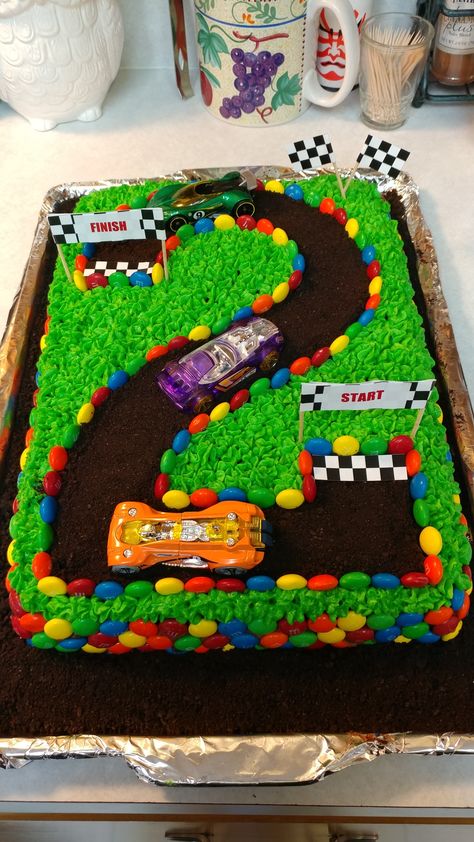 Made this for my sons second birthday! Cars Cake For Boys, Cake For Boys Birthday, Car Cakes For Boys, Car Cakes, Truck Birthday Cakes, Race Car Cakes, Cars Birthday Cake, Cars Cake, Hot Wheels Birthday