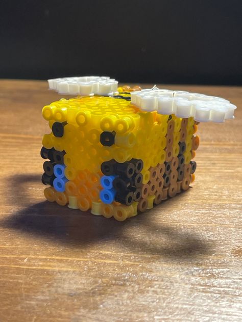 Minecraft bee made out of perler beads (the design is not mine) Minecraft Bee Perler Beads, Perler Beads, Making Out, Minecraft, Bee, Beads, Design