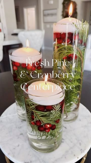 Floating Cranberries Centerpiece, Holiday Floating Candle Centerpieces, Floating Candles For Christmas, Floating Candle Centerpieces Christmas, Cranberry Centerpiece Christmas, Floating Christmas Candles, Christmas Vase Arrangements, Diy Christmas Flower Arrangements, Candle Tray Centerpiece