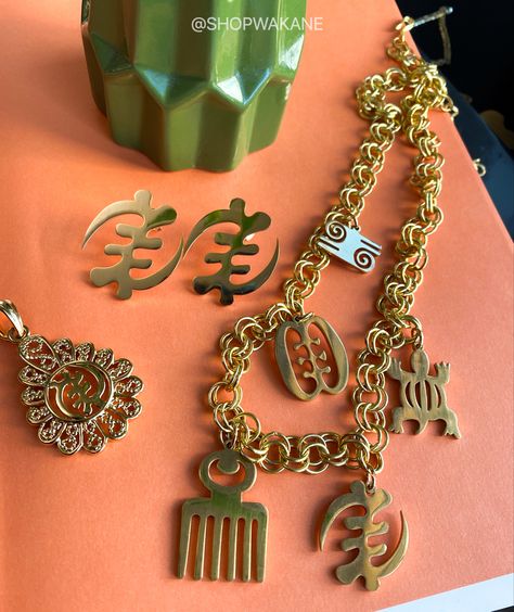 Shop our ‘Adinkra’ symbol collection by visiting out site wakaneaccessories.com Afro Pick, African Inspired Jewelry, Symbol Jewelry, Ankh Necklace, African Accessories, Adinkra Symbols, Green Gown, Egyptian Jewelry, Map Necklace