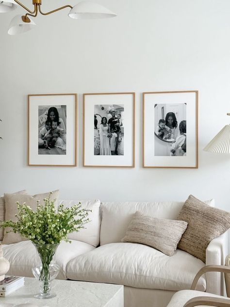 20-27 All White Gallery Wall, Display Pictures In Home, Wall Picture Decor Living Room, Small Living Room Picture Wall, Gallery Wall Engagement Pictures, Living Room Picture Frame Ideas, Over The Couch Wall Art, 3 Large Picture Frames On Wall, Living Room Decor Family Pictures