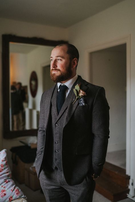 Groom in three piece dark grey suit with patterned handkerchief and toffee rose boutonnière Charcoal Groom Suit, Dark Grey Suit Wedding, Dark Wedding Suit, Dark Gray Wedding Suit, Dark Grey Groom Suit, Dark Grey Wedding Suit, Dark Tweed Wedding Suit, Dark Grey Groomsmen Suits, Charcoal Grey Suit Wedding