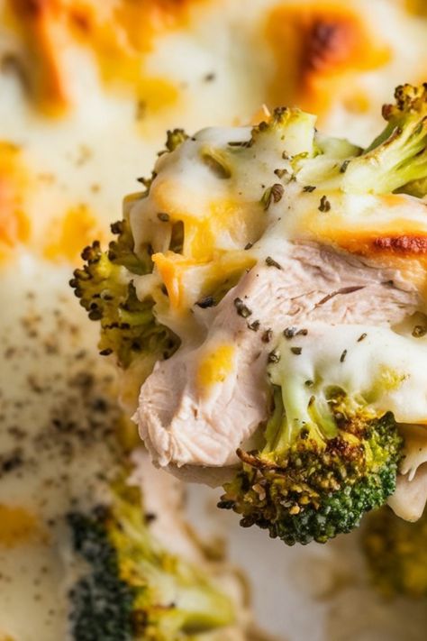 Chicken and broccoli covered in melted cheese and herbs. Keto Chicken And Green Beans, Keto Cheesy Broccoli, Keto Chicken Casserole Recipes, Keto Chicken And Broccoli, Broccoli And Chicken Casserole, Keto Cheesy Chicken, Shredded Chicken Casserole, Broccoli Chicken Casserole, Broccoli And Chicken