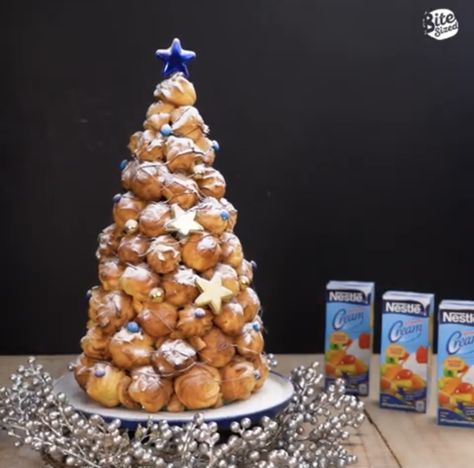 Cream Puff Trees #caramel #christmas #creampuffs #creamy #dessert #festive #holiday #nestlé #vanilla Cream Puff Christmas Tree, Cream Puff Tree, Christmas Cream Puffs, Cream Puff Tower, Cream Filled Puff Pastry, Cream Puff Dough, Caramel Christmas, Cream Puff Dessert, Cream Puffs Easy