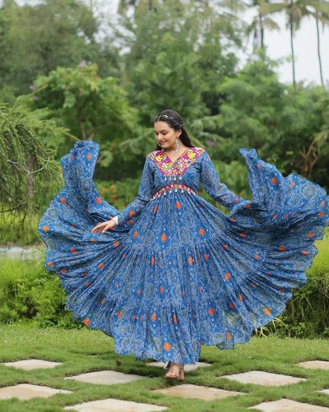 "Get ready to dazzle this Navratri! 💃🏻✨ Introducing our 2024 collection featuring stunning gowns with Bandhani print work and intricate Kutchi patchwork on luxurious Faux Georgette. Fall in love with our #Gownlove! #weareffortlessly #NavratriGowns #FestiveFashion #BandhaniPrint #KutchiPatchwork #FauxGeorgette #NavratriVibes #EthnicGlam" Gown:- 👇🏻 ▪️ Fabrics & Work :- Bandhani Print work with kutchi patchework in Faux Georgette. ▪️ Size :- L Size ,40 Inch Stitched (User can adjust From 38" to... Bandhani Print Georgette Blouse Piece For Navratri, Navratri Semi-stitched Bandhani Blouse Piece, Navratri Georgette Traditional Wear With Printed Motifs, Navratri Georgette Dress With Floral Print, Semi-stitched Navratri Blouse Piece With Floral Print, Stunning Gowns, Blouse Pattern, Full Sleeve, Festival Fashion