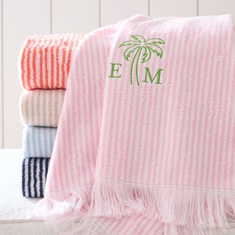 With classic and colorful thin stripes and a hand-knotted tassel fringe, these luxuriously soft, quick-drying towels are perfect for beach days, poolside lounging and spring break getaways. Made from Turkish Aerospin cotton, each towel is woven using an advanced spinning technique that allows air to pass through the fibers making it incredibly soft and super absorbent. Embroider the name of your boat, beach house or girl's weekend to the towel for a playful personalized touch.  40" w x 72" h; Ta Monogram Beach Towel, Bridesmaid Towels, Beach Towel Aesthetic, Tennis Shirts Designs, Cute Beach Towels, Blue Beach Towel, Spring Break Getaways, Florida Apartment, Bachelorette Pool