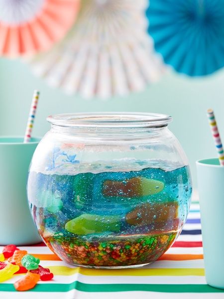 This Easy Jello Fishbowl Will Make You a Summer Hero Fish Bowl Jello, Jello Aquarium, Fish Bowl Recipe, Shark Week Food, Fishbowl Drink, Gummy Fish, Blue Jello, Leftover Halloween Candy, Nerds Candy