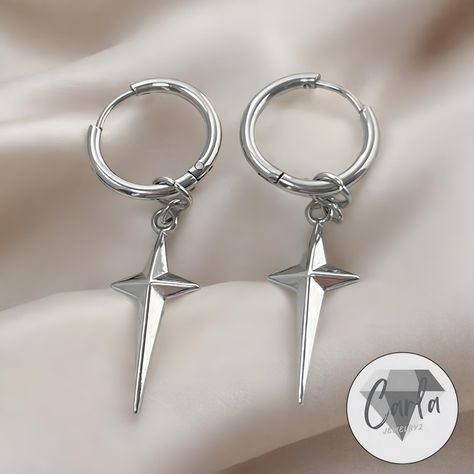 - Each piece of our jewelry is meticulously created with Love and Care ♡ W H A T  ∙  IS  ∙  T H I S - Discover the edgy allure of our Men's Dangle Punk Star Earrings, a perfect accessory for those who embrace a bold, rebellious style. These striking earrings feature a distinctive silver star design that dangles effortlessly, adding a dynamic touch to any outfit. Crafted from high-quality silver, they combine durability with a sleek, polished finish that catches the light with every movement. Ide Men Dangle Earring, Mens Earring, Punk Mode, Silver Earrings Set, Dangle Cross Earrings, Earrings Mens, Punk Men, Silver Star Earrings, Teeth Jewelry