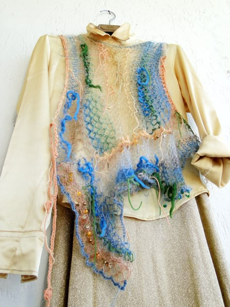 https://flic.kr/p/2g6BC3y | Castles of sand washed away in no time | 2018 collection  silk kid mohair with incorporated pearls,  sequines & rocailles in  matching colors textured with interwoven  scraps of all sorts  semi-transparent fragile freeform fusion exploring new techniques  as always the mini-top is multiversatile offering infinite wearing options  for playful individuals who like to express  who they truly are Knitting Dress, Knitwear Collection, Knitwear Trends, Crochet Jumper, Handmade Knitwear, Kids Crochet, Silk Art, Quirky Fashion, Mini Top