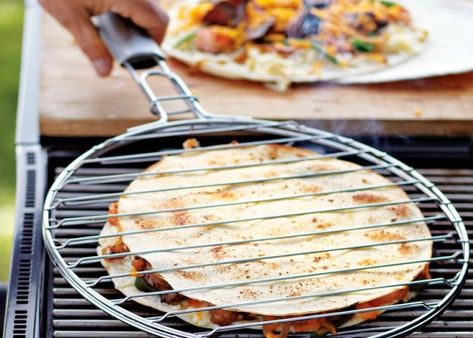 a Grilled Quesadilla in a cooking rack over a camping grill #outdoors #food Grilled Quesadilla, Camping Diy, Grill Basket, Campfire Food, Campfire Cooking, Easy Camping, Camp Cooking, Camping Ideas, Camping Food