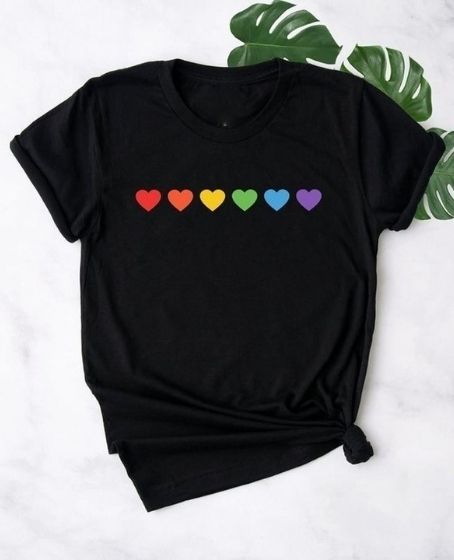 Don this tee to express the infinite capacity of the heart to love without restrictions and prejudices. #EmbraceLoveFreedom #LoveIsLoveFashion #InclusiveLove Thread Twitter, European Clothing, Pride Lesbian, European Outfit, Gay Pride Shirts, Rainbow Hearts, Love Wins, Lgbt Love, Heart Tee