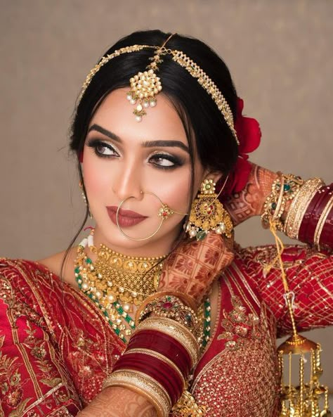 Shining in Red: Bridal Makeup that Stuns ❤️✨ #BridalGlam #RedHotBride #WeddingReady Red Bridal Makeup, Good Quality Wallpaper, Wallpaper Kitchen Wall, Indian Bride Photography Poses, Indian Bride Makeup, Bridal Makeup Images, Indian Bridal Photos, Indian Bride Outfits, Bride Photography Poses