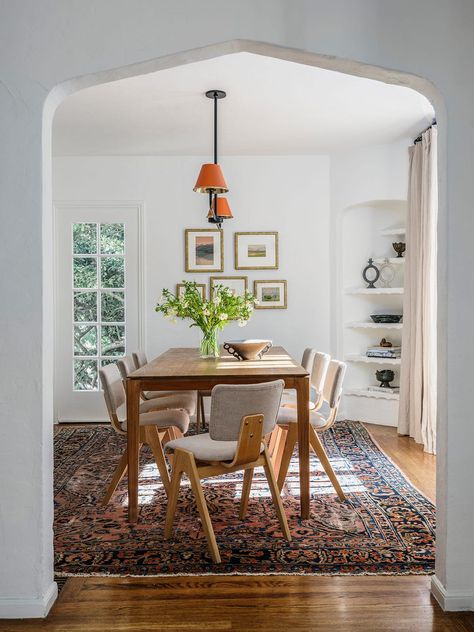 a dining room table with a lamp and area rug Kitchen Table Rug, Transitional Modern Home, Seating Wall, Best Dining Room, White Dining Room, Brick Exterior House, Dining Room Combo, Beautiful Dining Rooms, Mid Century Dining