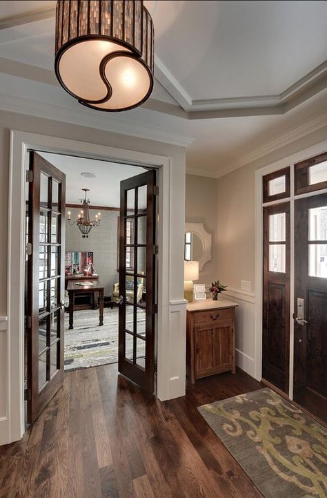 this makes me want to stain the french doors to our office. - love the dark doors with the white trim! Pintu Interior, Stained Trim, Dark Doors, Stained Doors, Brown Doors, Paris Grey, White Doors, French Doors Interior, Design Light