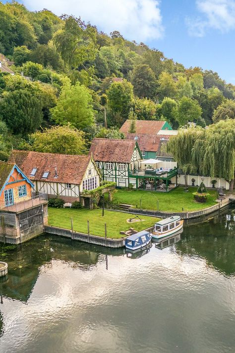 If you harbour secret dreams of living by a river, we have just the property for you. This former boathouse in Crookham Dean has been transformed into a luxurious two-bedroom riverside property that boasts a riverbank garden complete with a private jetty with space for moorings. Wooden Countertops, Riverside House, Wind In The Willows, Front Deck, Country Style Kitchen, Country Homes, Perfect Life, Open Plan Living, Ceramic Decor