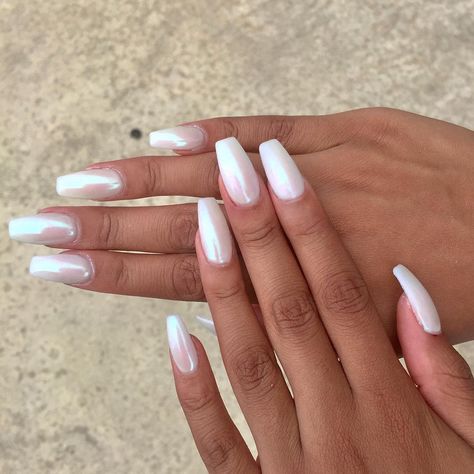 Celebrities like Selena Gomez, Jennifer Lopez, and Rihanna have worn the pearly white nail polish trend. White Chrome Nails, Nail Appointment, Nagellack Trends, Celebrity Nails, White Acrylic Nails, Nail Polish Trends, White Nail Polish, Pearl Nails, White Nail