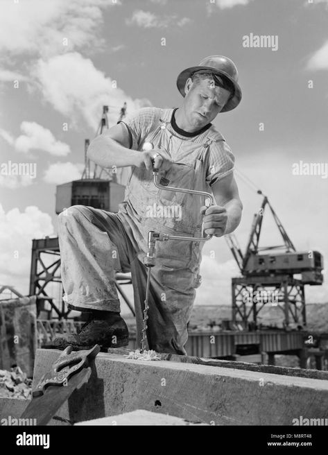 Download this stock image: Carpenter Drilling Hole at Tennessee Valley Authority's new Douglas Dam, French Broad River, Sevier County, Tennessee, USA, Alfred T. Palmer for Office of War Information, June 1942 - M8RT48 from Alamy's library of millions of high resolution stock photos, illustrations and vectors. Tennessee Valley Authority, Male Man, Drilling Holes, Image Processing, Tennessee, Chevy, Portrait Photography, Photo Image, Resolution