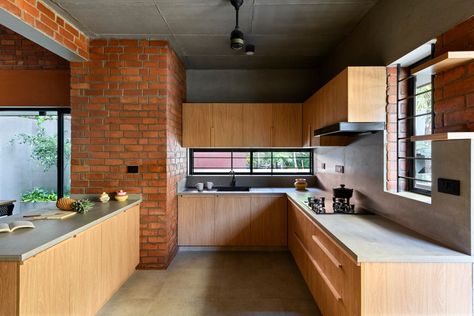 Inside a minimalist Kerala home that highlights the beauty and simplicity of brick | Architectural Digest India Online Architecture, Diwali Poster, Concept Models Architecture, Small Kitchen Layouts, Brick Kitchen, Kerala Houses, Brick Texture, Architecture Model House, Brick Architecture