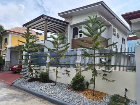 Live in style in this beautiful 2-story, single-detached house in Angeles City!  This modern home features 3 large bedrooms, 4 bathrooms, 2 carports, and a strategic location within the exclusive Timog Park subdivision. Enjoy the convenience of being close to restaurants, cafes, supermarkets, and more!  Don't miss out - Schedule a viewing today! Philippines Mansion, Houses In Philippines, House In The Philippines, Puzzle Mansion Tagaytay, Houses For Rent Watertown Sd. Under. Prices. 100.00, Live In Style, Rooms For Rent, Large Bedroom, Detached House