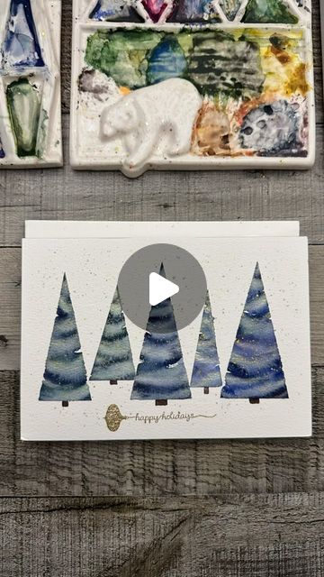 Amber Lane | Watercolor Artist on Instagram: "Paint this loose and fun holiday winter card with me! Shimmer is glowing coral handmade paint by @cozmickcreations_watercolors Matte handmade colors are by @mashaswatercolors Trunks painted with Hallow from @kozpaints Embossing tools by @ranger_ink & @tsukineko_official Paper is 100% cotton Baohong from @allaboutartinter (discount code in link in bio). Original idea from @garimasrivastava_art …check hers out too! #handmadecard #handmadechristmascards #christmascards #christmaswatercolor #watercolorchristmas #watercolorwinter #paintingtrees #paintingchristmas #watercolorforrelaxation" Christmas Tree Cards Handmade, Christmas Watercolors, Watercolor Christmas Cards Diy, Watercolor Holiday Cards, Embossing Tools, Christmas Canvas Art, Simple Cards Handmade, Watercolor Christmas Tree, Tori Kelly