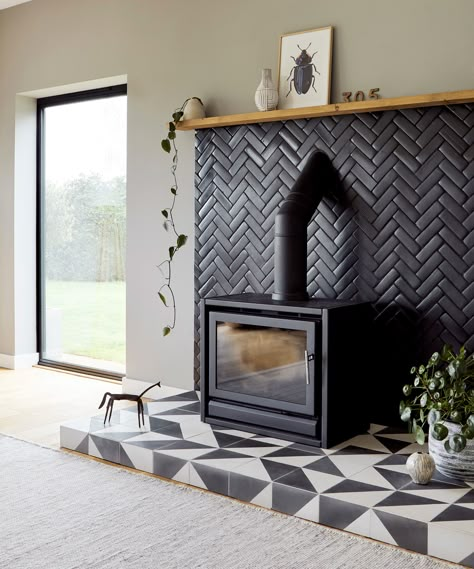 Fireplace tile ideas – 10 decorative designs using ceramic, porcelain, metal and more | Real Homes Fireplace Tile Ideas, Corner Wood Stove, Wood Stove Surround, Wood Burner Fireplace, Wood Burning Stoves Living Room, Log Burner Living Room, Standing Fireplace, Wood Stove Fireplace, Freestanding Fireplace