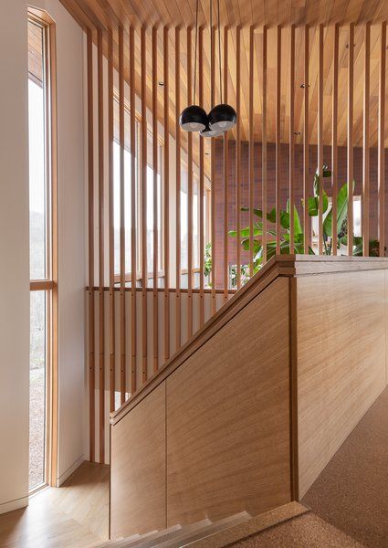 Photo 10 of 12 in The Wriff Residence by Guggenheim Architecture + Design Studio - Dwell Oak Handrail, Architecture Design Studio, Wood Railing, Wood Slat Wall, Stair Case, Modern Staircase, Slat Wall, Wooden Slats, Staircase Design