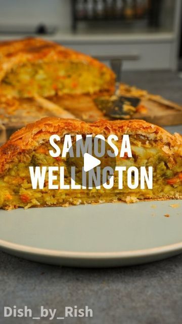 Rishi Nanavati on Instagram: "Let's make a Samosa Wellington. Which is basically just a giant samosa.

We've got a vegetable samosa filling stuffed inside puff pastry, with a sweet and sour tamarind glaze brushed on the inside. And my favourite way to serve this is with some masala onion gravy.

It's packed with onion, garlic, ginger, chilli, spices, carrots, peas, and potato. It's perfect for a (not so traditional) festive centrepiece, especially when it's packed with flavour.

This makes for a great vegetarian Christmas main, and it can easily be made vegan if you use vegan puff pastry.

Full recipes for the samosa wellington and the masala onion gravy are on the blog! Link is in my bio!

Peace ✌🏽
#samosa #wellington #Christmasdinner #Christmasrecipes #vegetarian #veganmains" Puff Pastry Recipes Vegetarian Indian, Chilli Spices, Samosa With Puff Pastry, Veggie Samosa Recipe, Vegetable Samosa Pie, Vegetarian Christmas Main, Vegetarian Samosas, Samosa Filling, Vegan Puff Pastry