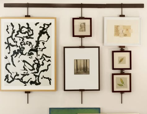 artwork hanging system - like this better than flexible wires that let paintings tip out - this would keep them straight. Gallery Wall Hanging System, Hanging Multiple Pictures, Art Hanging System, Graffiti Ideas, Gallery Wall Hanging, Hanging System, Hanging Picture Frames, Diy Picture Frames, Wall Hanging Diy