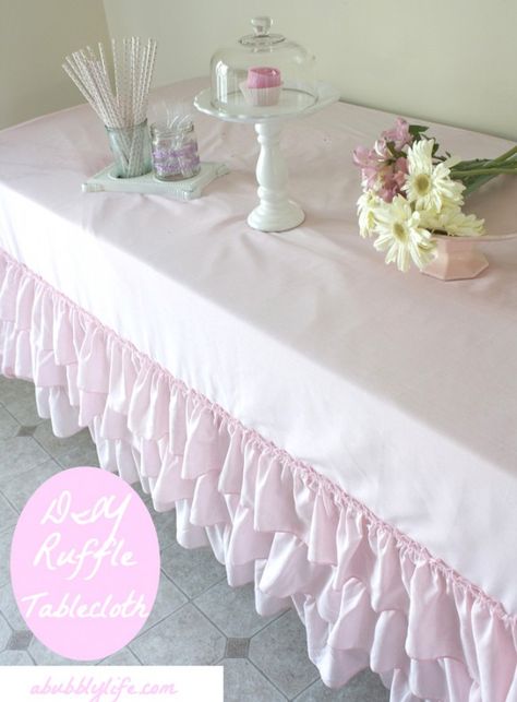 DIY no sew ruffled table cloth, using ruffled thrift store sheets/bed skirts and washable fabric glue. Who would have thought?! Ruffle Tablecloth, Tablecloth Diy, Ruffled Tablecloth, Diy Ruffle, Table Skirts, Handmade Tablecloth, Diy Bebe, Craft Show Displays, Table Skirt