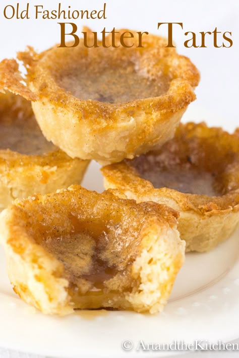 Indulge in some great Old Fashioned Butter Tarts. A Canadian classic dessert recipe with sweet, slightly runny filling and made from scratch, flaky, melt in your mouth pastry. via @artandthekitch Canadian Dessert Recipes, Best Butter Tart Recipe, Canadian Dessert, Butter Tart, Butter Tarts, Mini Pies, Classic Desserts, Pies And Tarts, Tart Recipes