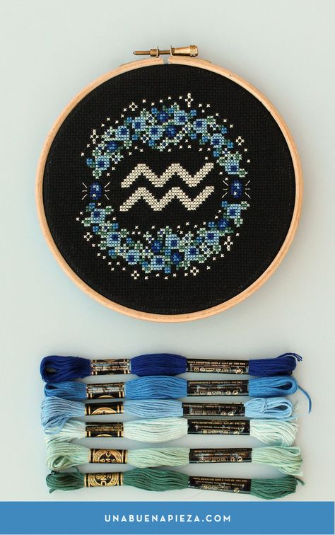 Cute aquarius cross stitch pattern. The astrological sign is surrounded by a wreath of blue flowers, which is aquarius' color. Embroider a nice gift for a special aquarius in your life! Designed by: Una Buena Pieza. Aquarius Cross Stitch Pattern, Aquarius Cross Stitch, Astrology Cross Stitch, Astrology Embroidery, Zodiac Cross Stitch, Astrological Sign, Aquarius Zodiac, Star Sign, Bead Jewellery