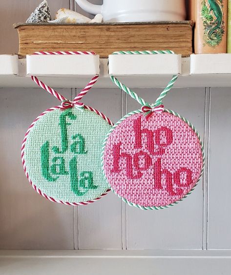 This FaLaLa  needlepoint canvas adds whimsy to the holiday season. Perfectly paired with the HoHoHo canvas, they make wonderful ornaments or gifts for the holiday season.  This needlepoint design is printed with high quality glicee-printed onto a 14-count mesh canvas. There is also the option to include color matched DMC embroidery floss.  The needlepoint canvas includes: canvas with applied artwork DMC embroidery floss (optional) finishing materials are not included. Christmas Needlepoint, Needlepoint Christmas Ornaments, Glicee Prints, Needlepoint Ornaments, Dmc Embroidery, Dmc Embroidery Floss, Needlepoint Christmas, Needlepoint Designs, Finishing Materials