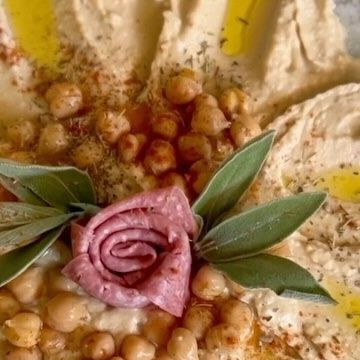 Mackenzie Biehl on Instagram: "Save for your next get together and follow @mackenziebiehl for more inspo. 🌼 Hummus Chickpeas Peppers or salami for a center rose Greenery for the stem Olive oil This would be great for a baby shower, bridal shower, garden party, birthday and more! Or just a girls night! #thefeedfeed #hummusplatter #mackdoesflowers" Bridal Shower Garden Party, Bridal Shower Garden, Hummus Platter, Shower Garden, Grazing Board, Make Hummus, Charcuterie Inspiration, Garden Party Birthday, Charcuterie And Cheese Board