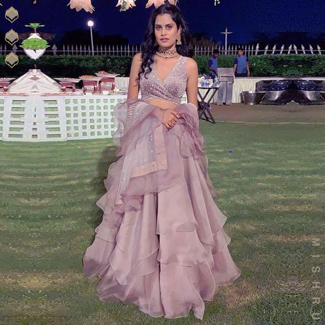 Looking like a surreal vision in our mauve layered organza lehenga with velvet wrap blouse and a ruffle dupatta!❤️ . . #Mishru #Wedding… Lehenga Blouse Pattern, Blouse Designs Aari Work, Ruffle Dupatta, Wanderlust Fashion, Choli Dress, Organza Lehenga, Lehnga Dress, Indian Bridal Lehenga, Wedding Blouse Designs