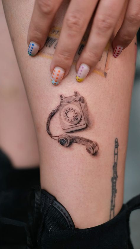 A vintage design to remember good old days #tattoo #microrealismtattoo #vintagetattoos #tattooformen Pay Phone Tattoo, Phone Tattoo Vintage, Vintage Phone Tattoo, Old Phone Tattoo, Rotary Phone Tattoo, Phone Tattoo, Microrealism Tattoo, Rotary Phone, Vintage Phones