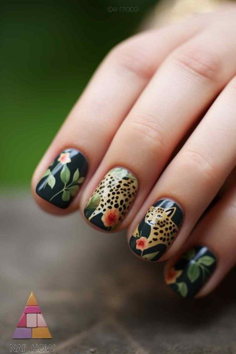 Bring the jungle to your fingertips with this stunning cheetah and floral nail art. The green base with detailed flowers and a cheetah accent creates a beautiful and exotic look. Discover more amazing designs at nailhow.com. Jungle Nails Design, Nail Designs Cheetah, Red Cheetah Nails, Jungle Nails, Zebra Nail Designs, Cheetah Face, Silk Wrap Nails, Cheetah Print Nails, Cheetah Nail Designs