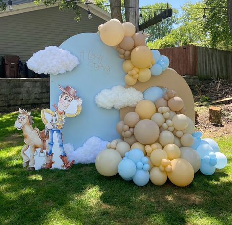 A Boy Story ☁️ Such a cute baby shower theme! Thank you @alejandrawink for trusting me!! Balloons Used @kalisanballoons White Sand… | Instagram Woody Balloon Arch, Woody Baby Shower Theme, It’s A Boy Story Baby Shower Centerpieces, Boy Toy Story Baby Shower Theme, Baby Boy First Birthday Decoration Ideas, It’s A Boy Story Decor, Toy Story Baby Shower Ideas Decorations, Baby Boy Themed Baby Shower Ideas, Baby Shower Toy Story Theme