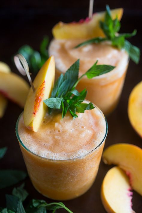 These peach tea bourbon slushies are the perfect summer addition. Full of peach tea, bourbon and lots of fresh peaches. This cocktail is summer perfection! from @nutmegnanny Bourbon Slushies, Bourbon Slush, Maki Sushi, Easy Sushi, Fresh Peaches, Japanese Recipes, Peach Tea, Mixed Drinks Recipes, Drinks Alcohol Recipes